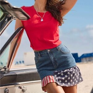 Venus All American Denim Mini Skirt in medium wash with a stars-and-stripes hem